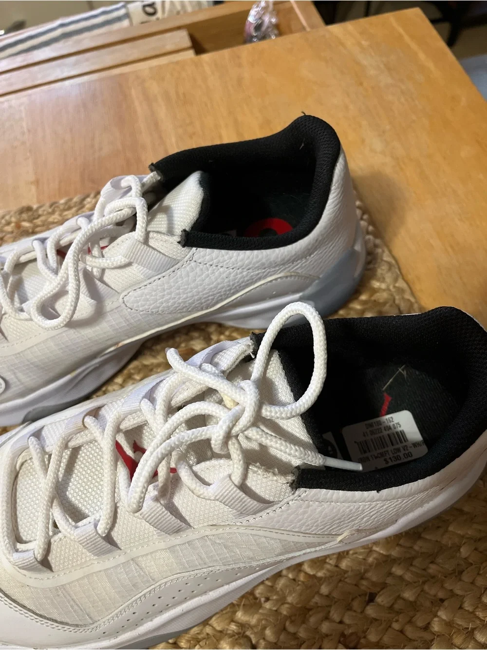 Jordan Men's White Athletic Shoes with Black Collar and Red Logo